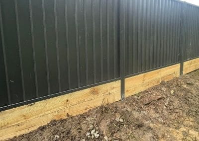 colorbond fence and timber retaining wall combo gold coast