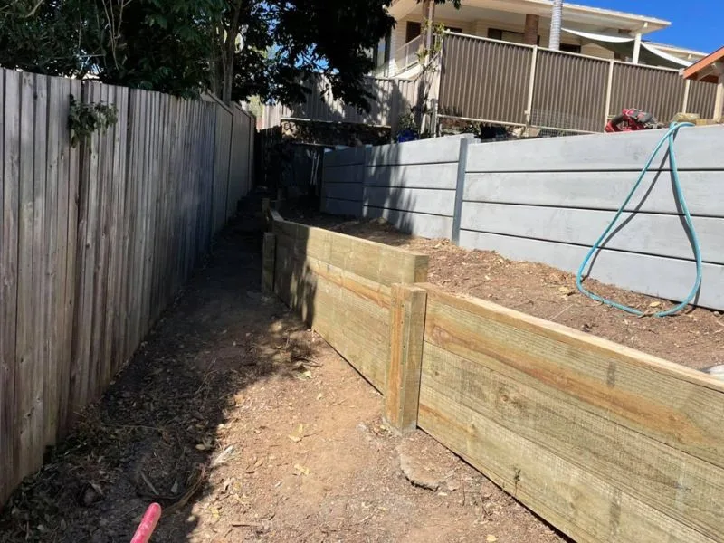After new timber sleeper retaining walls