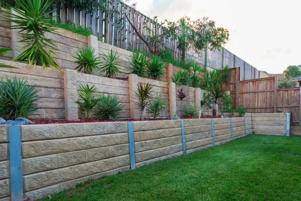 Tiered concrete sleeper retaining walls